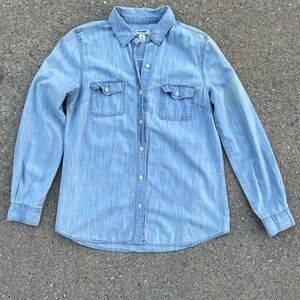 Light blue denim button-up shirt